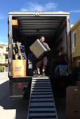 Professional Movers Unloading Truck